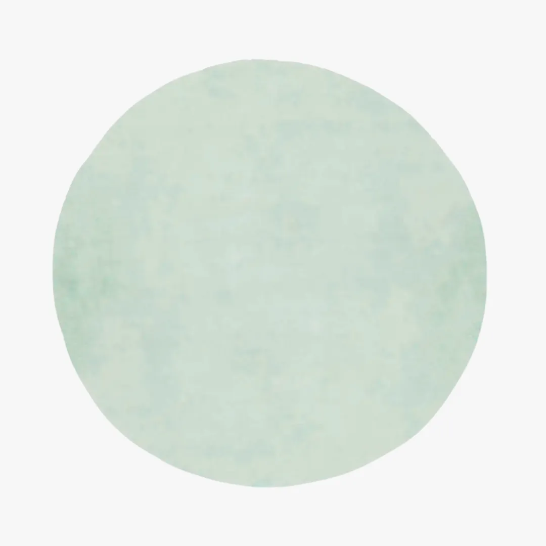 solid green round hand tufted rug