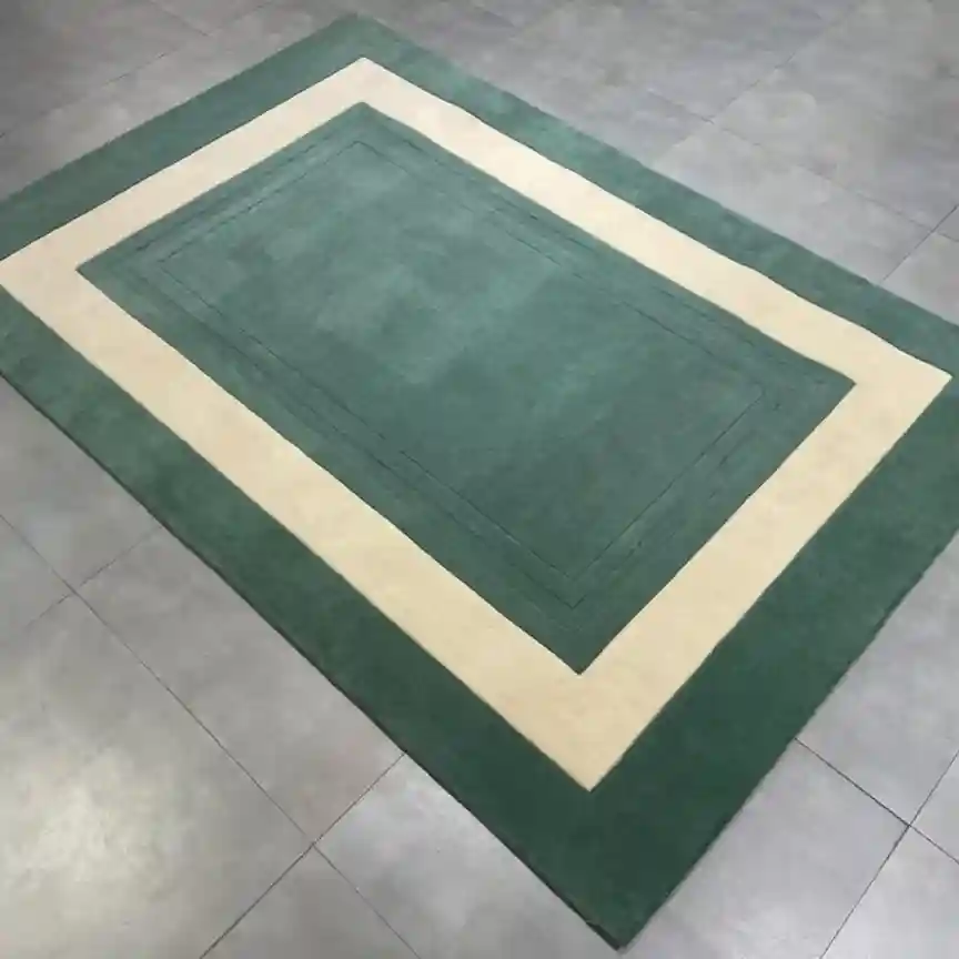 solid teal border hand tufted rug