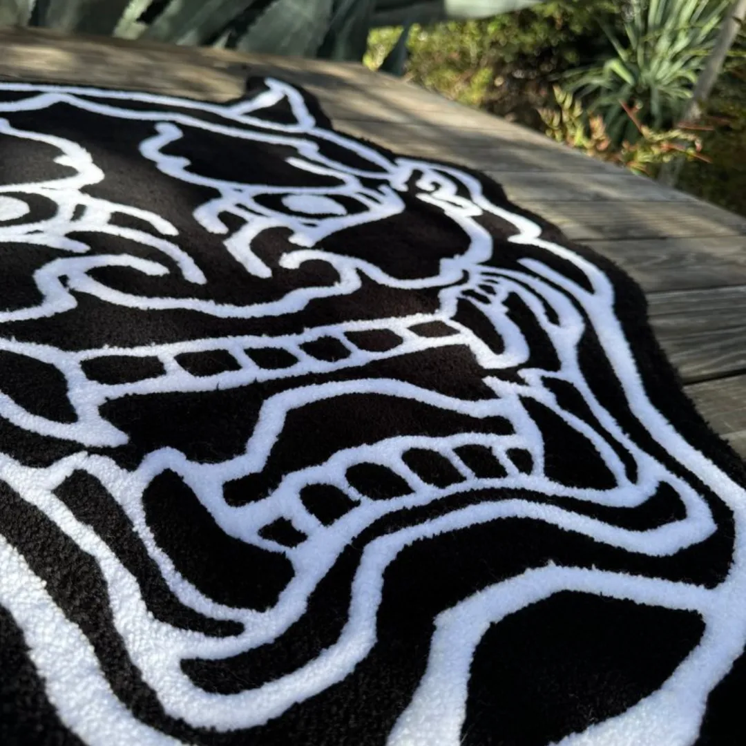 Black and white Hannya Mask floor rug with clean cut lines
