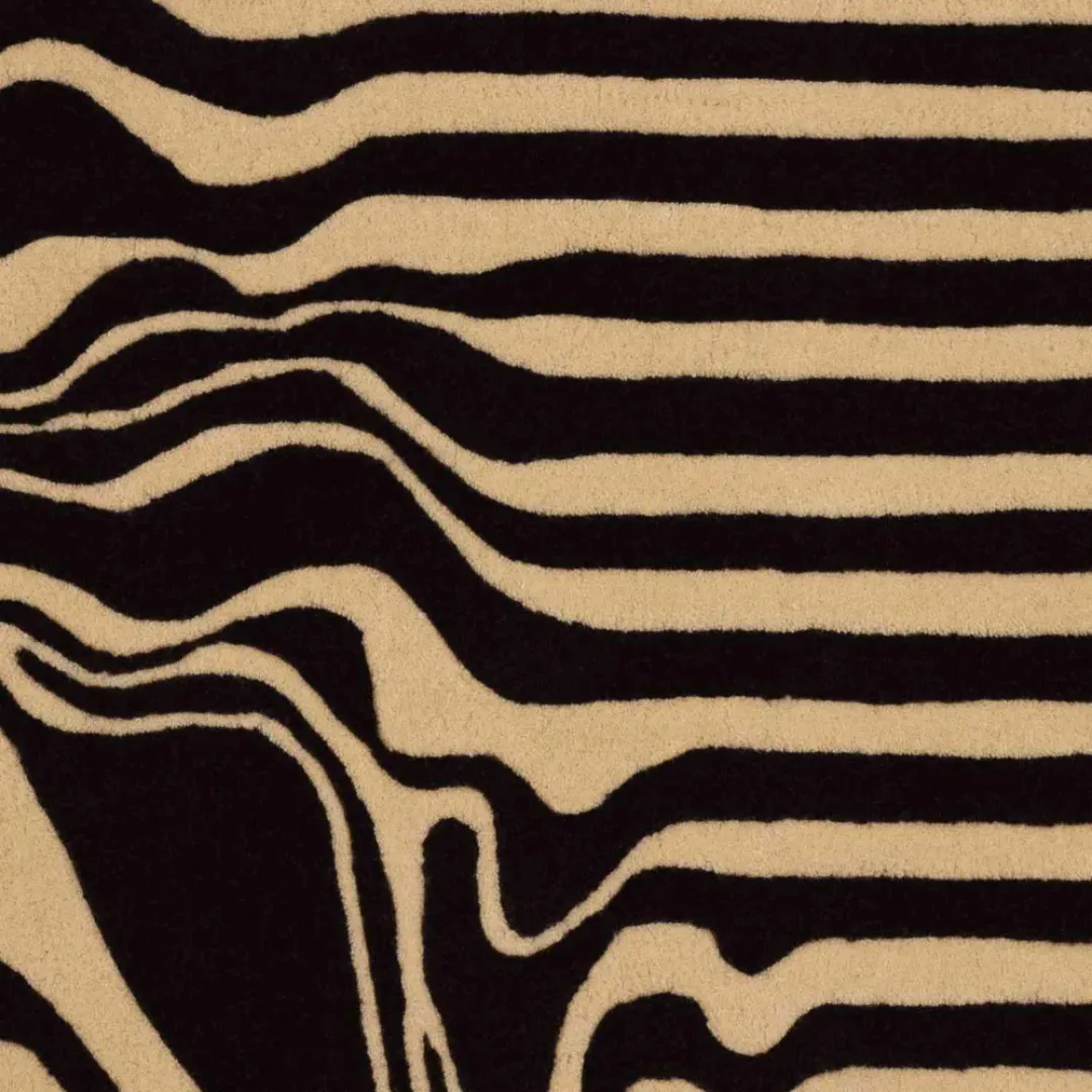 Hand-tufted wool detail showing soft blend of lines