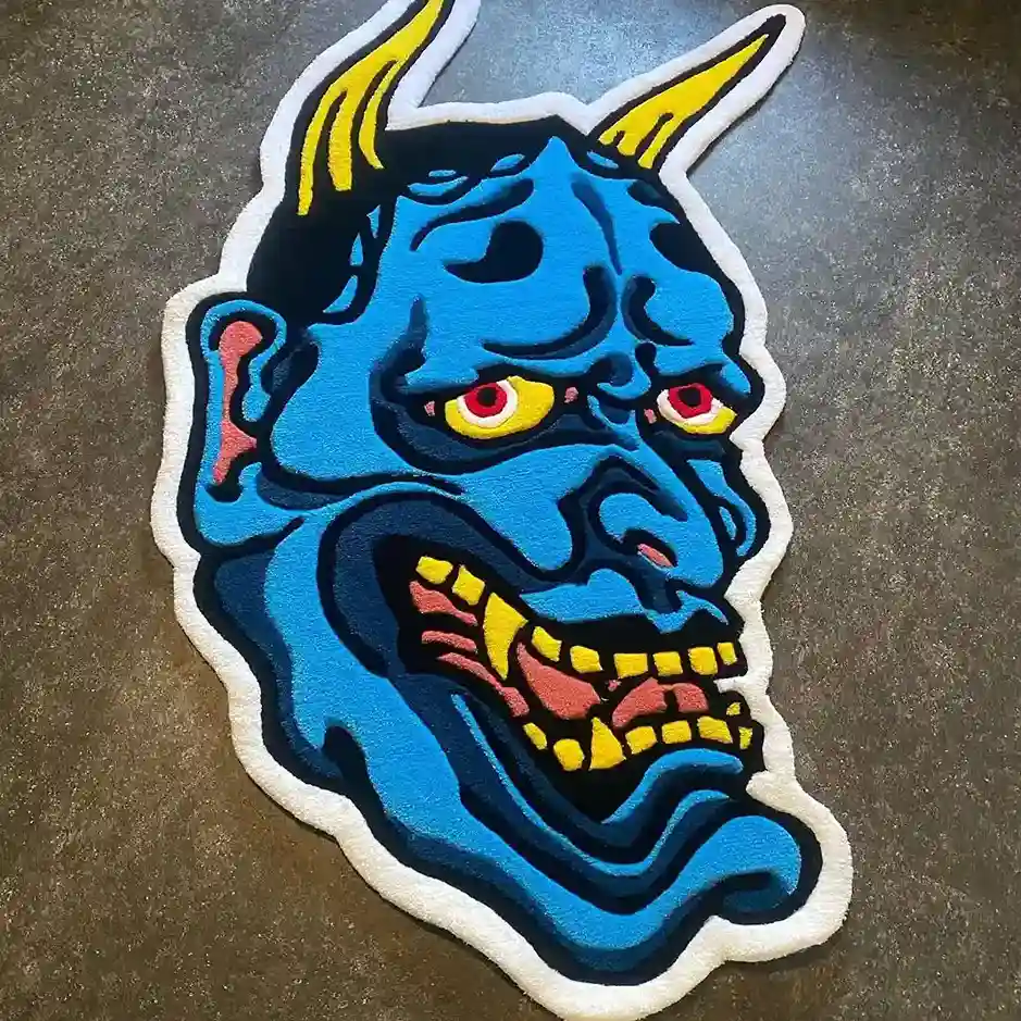Hand-tufted Blue Hannya Mask Rug with tattoo art design on floor