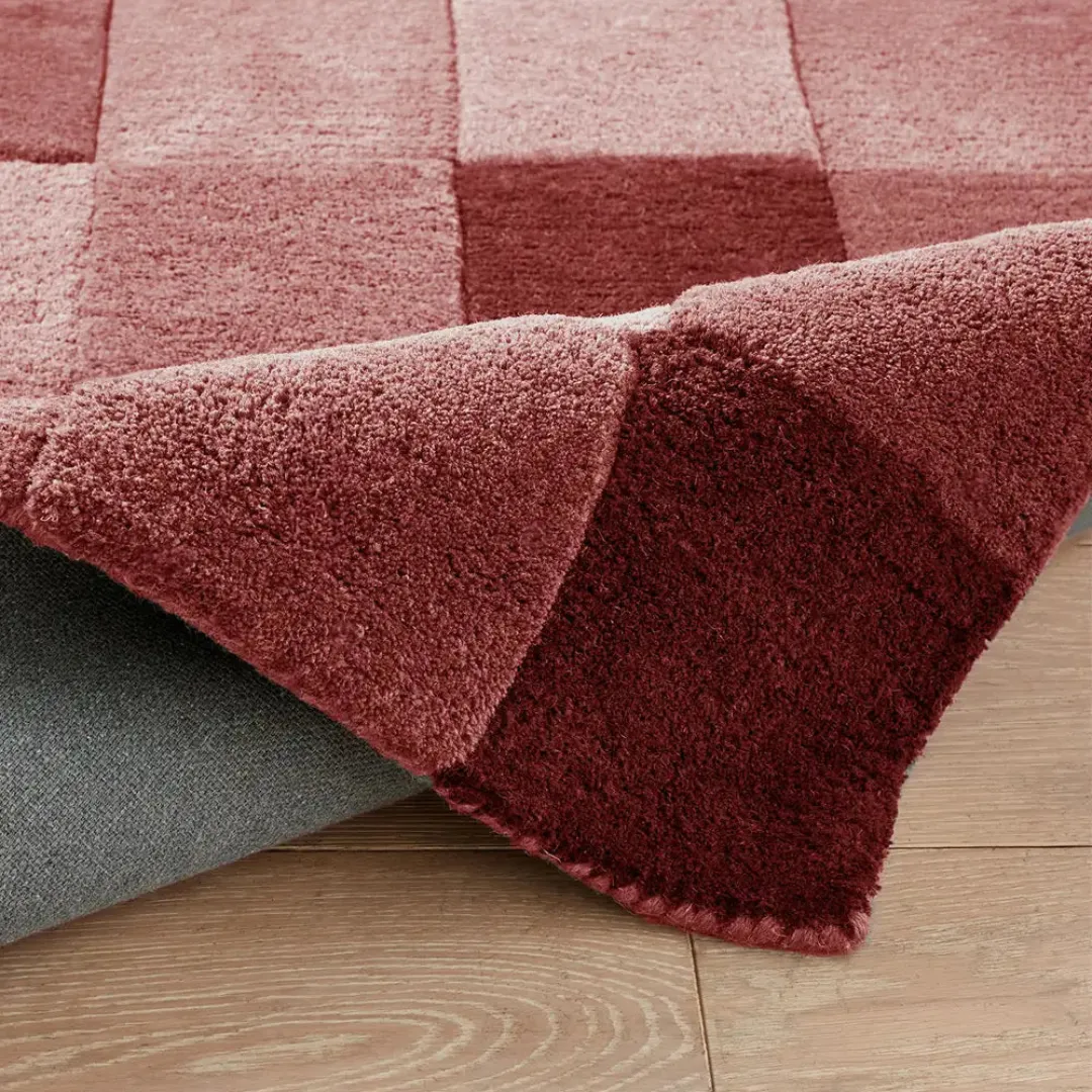 Hand tufted brown checkerboard rug in modern living room