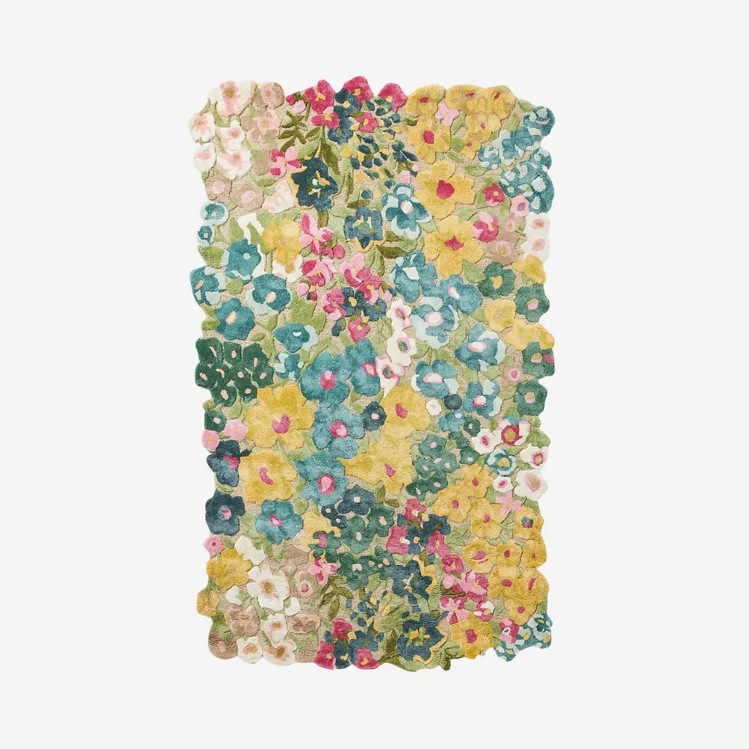 Cassia Floral Yellow Area Rug with blue and yellow painterly flowers