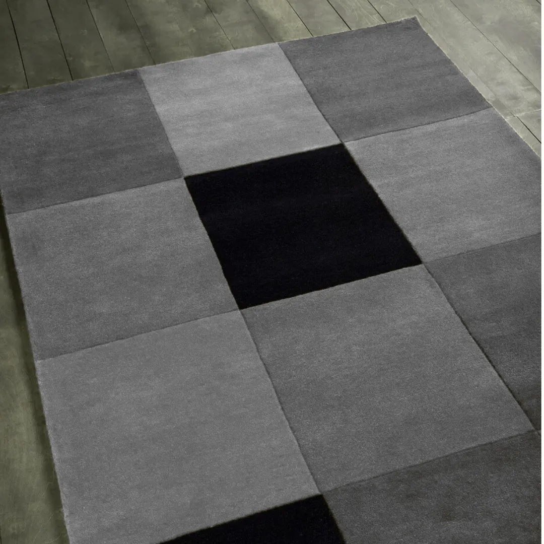 Top view of rug showing bold blocks in muted tones