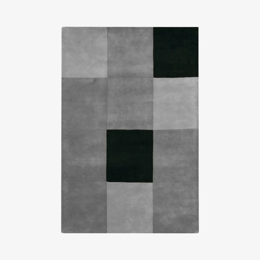 Charcoal and gray block pattern rug in rectangular layout