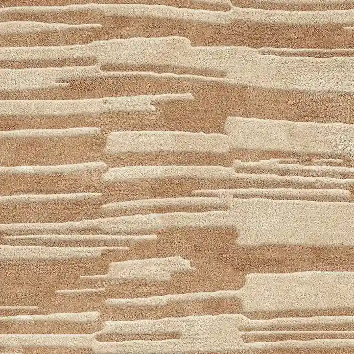 Hand-tufted sand-toned rug with sculpted high-low pile
