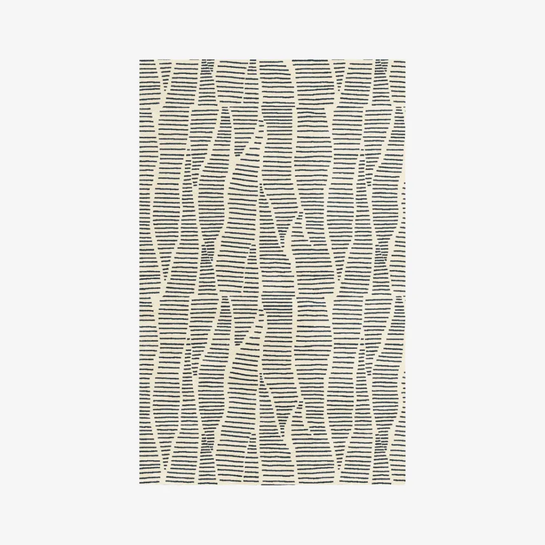 Beige hand-tufted wool rug with soft pile and clean edges