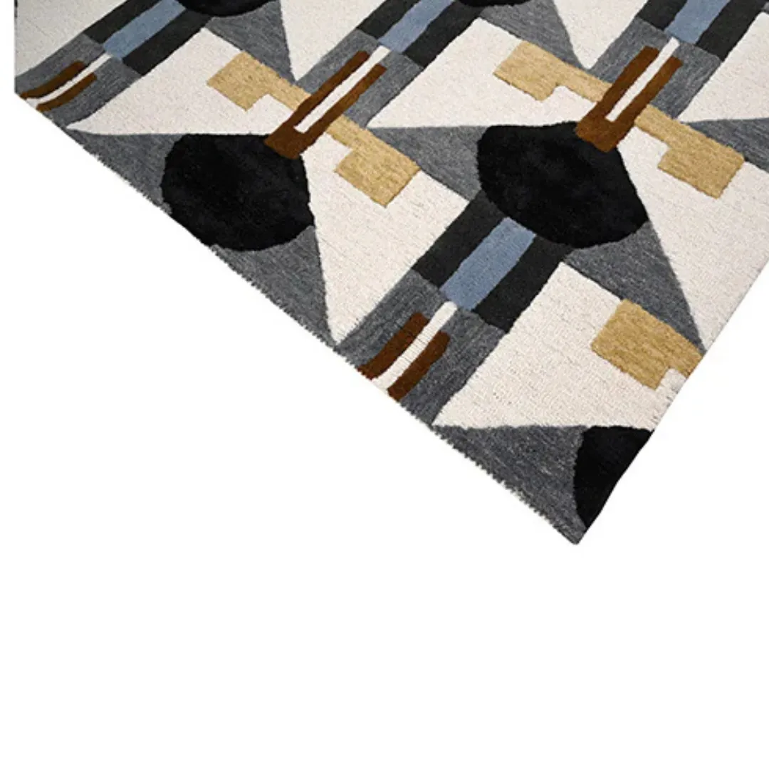 Contemporary rug featuring black, gray, and beige grid design