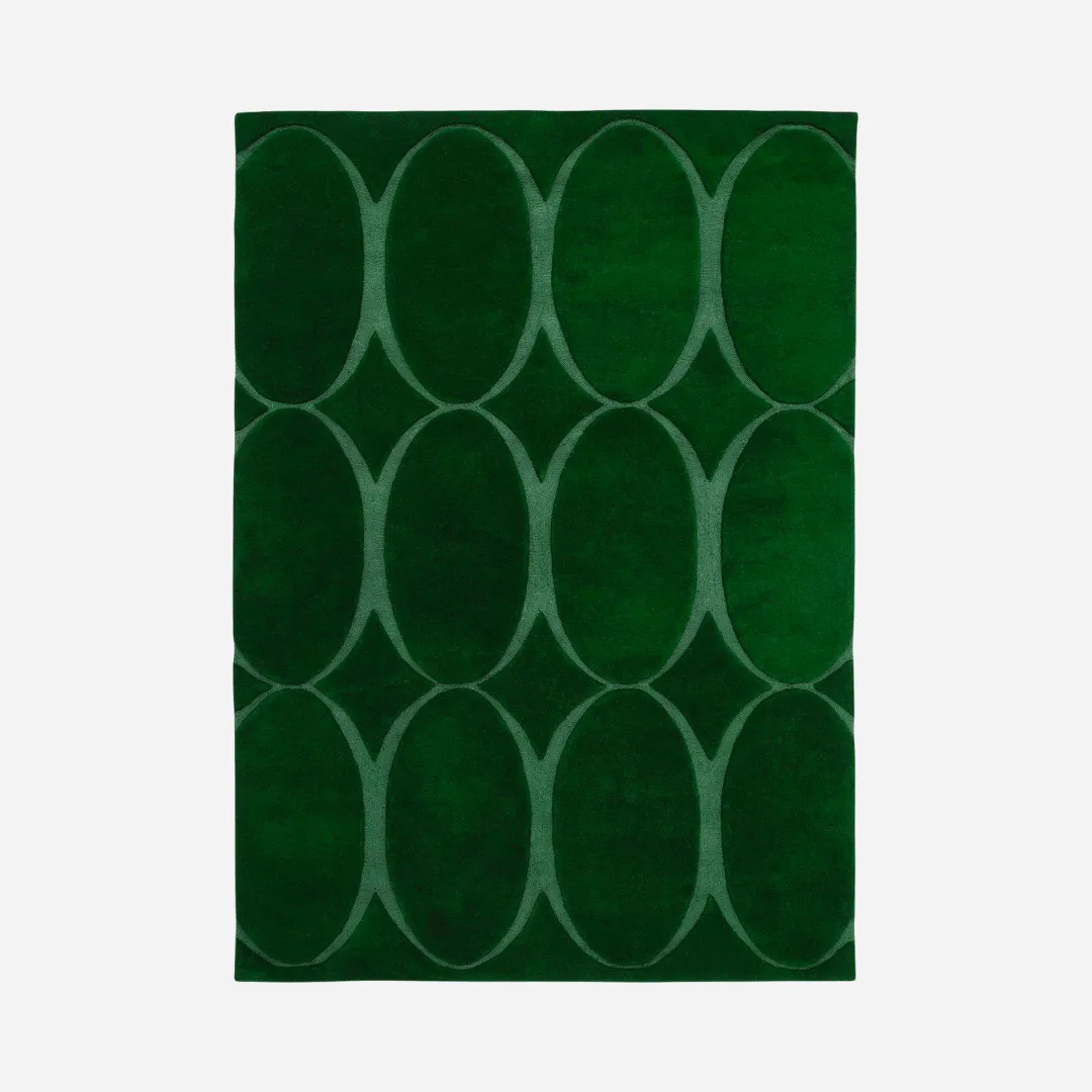Soft green oval patterned wool rug