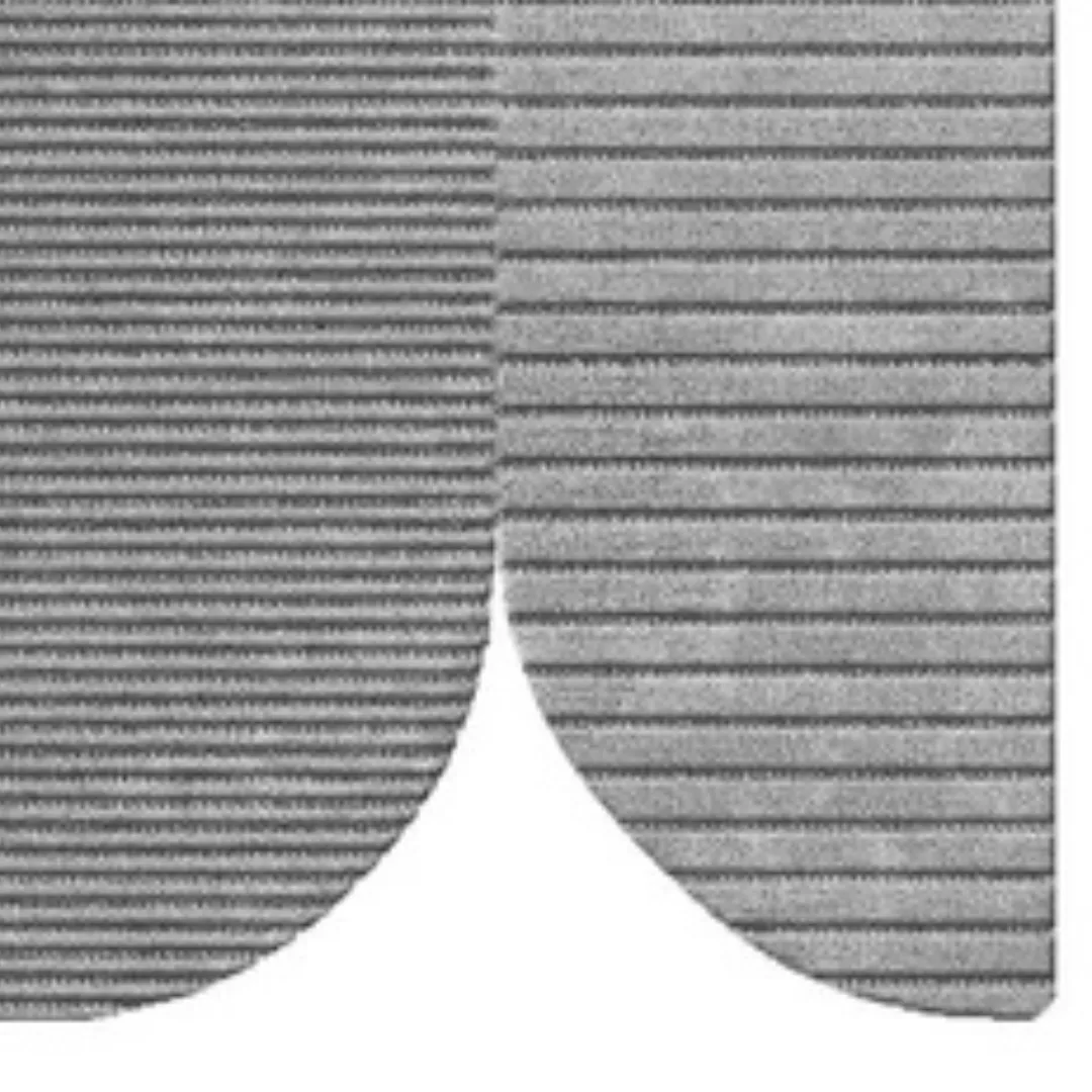 Gray area rug in a modern minimalist living room