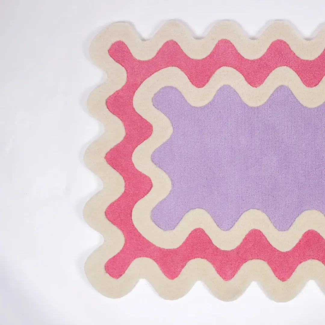 Wavy-edge pastel runner rug in narrow hallway