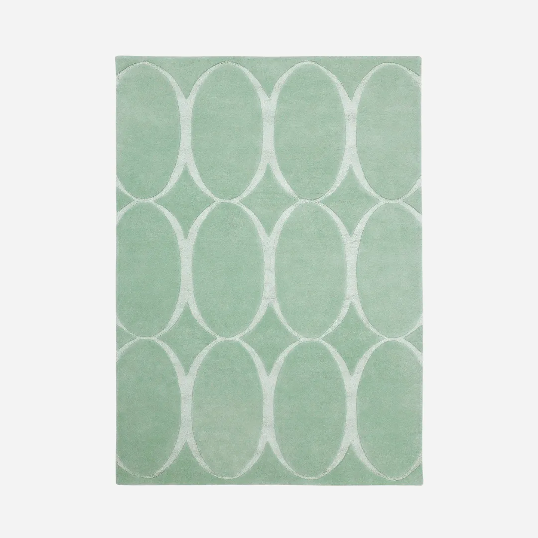 Mint green oval pattern wool area rug
