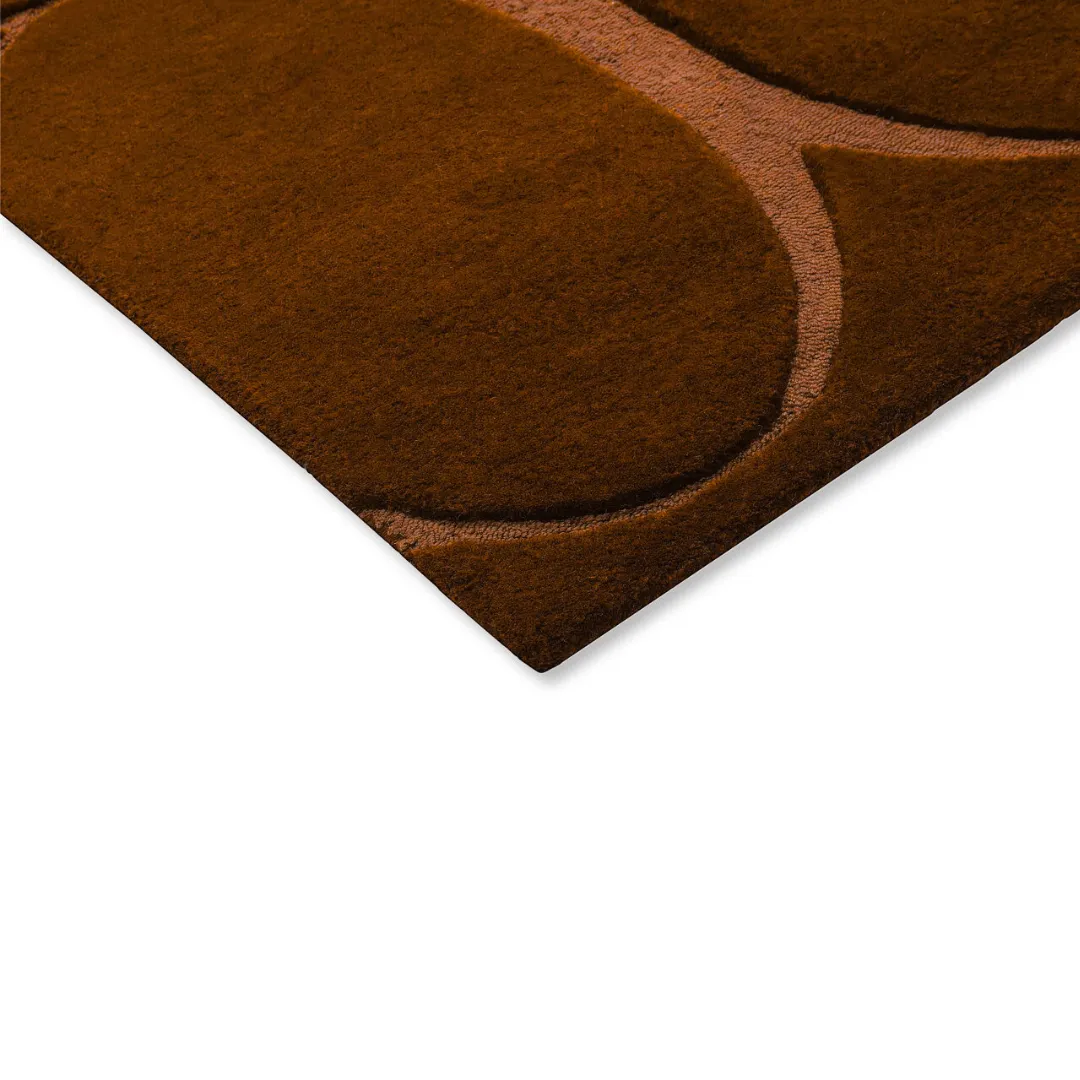 Soft wool rug in orange with ivory accents