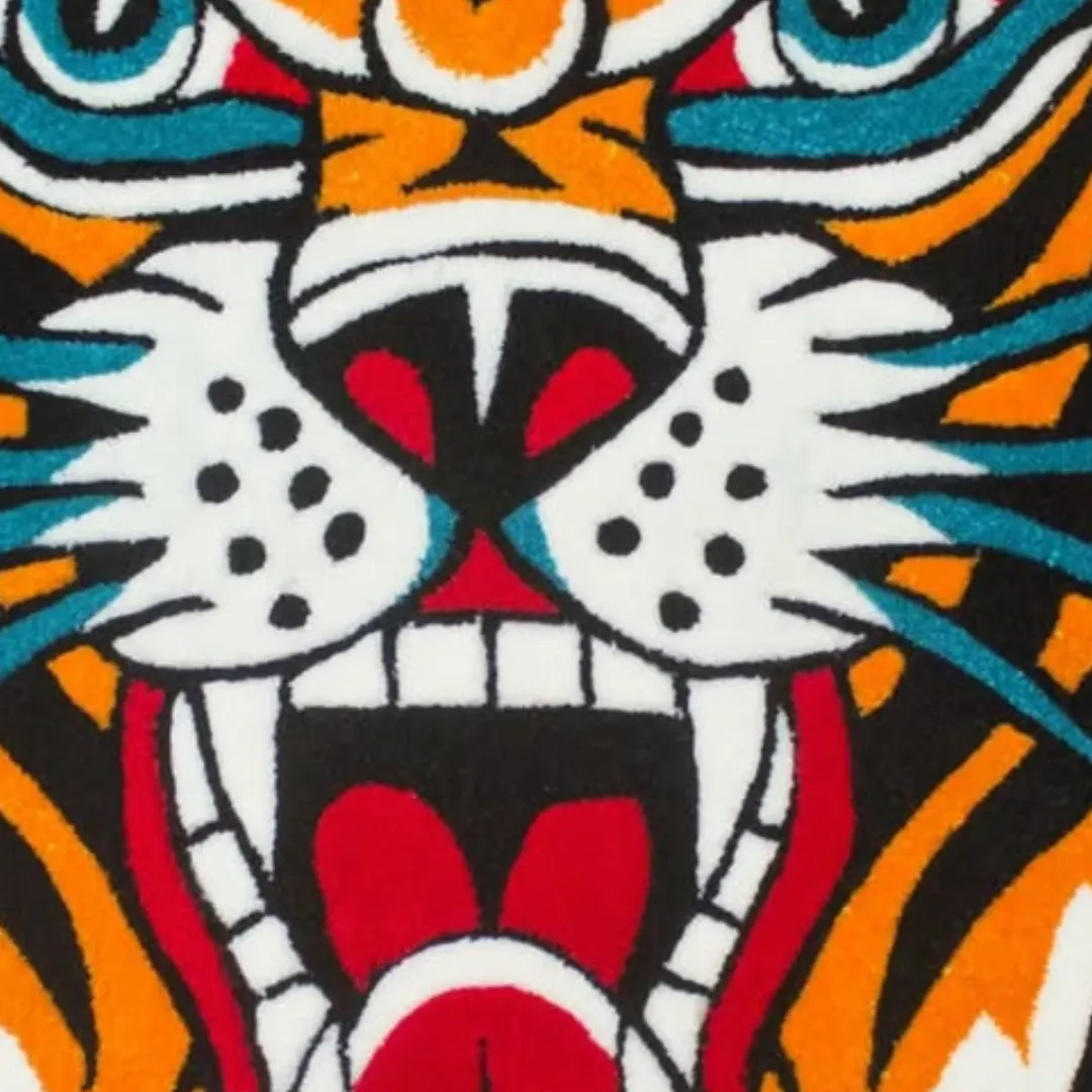 Custom-shaped tiger face rug with fierce expression and bold colors
