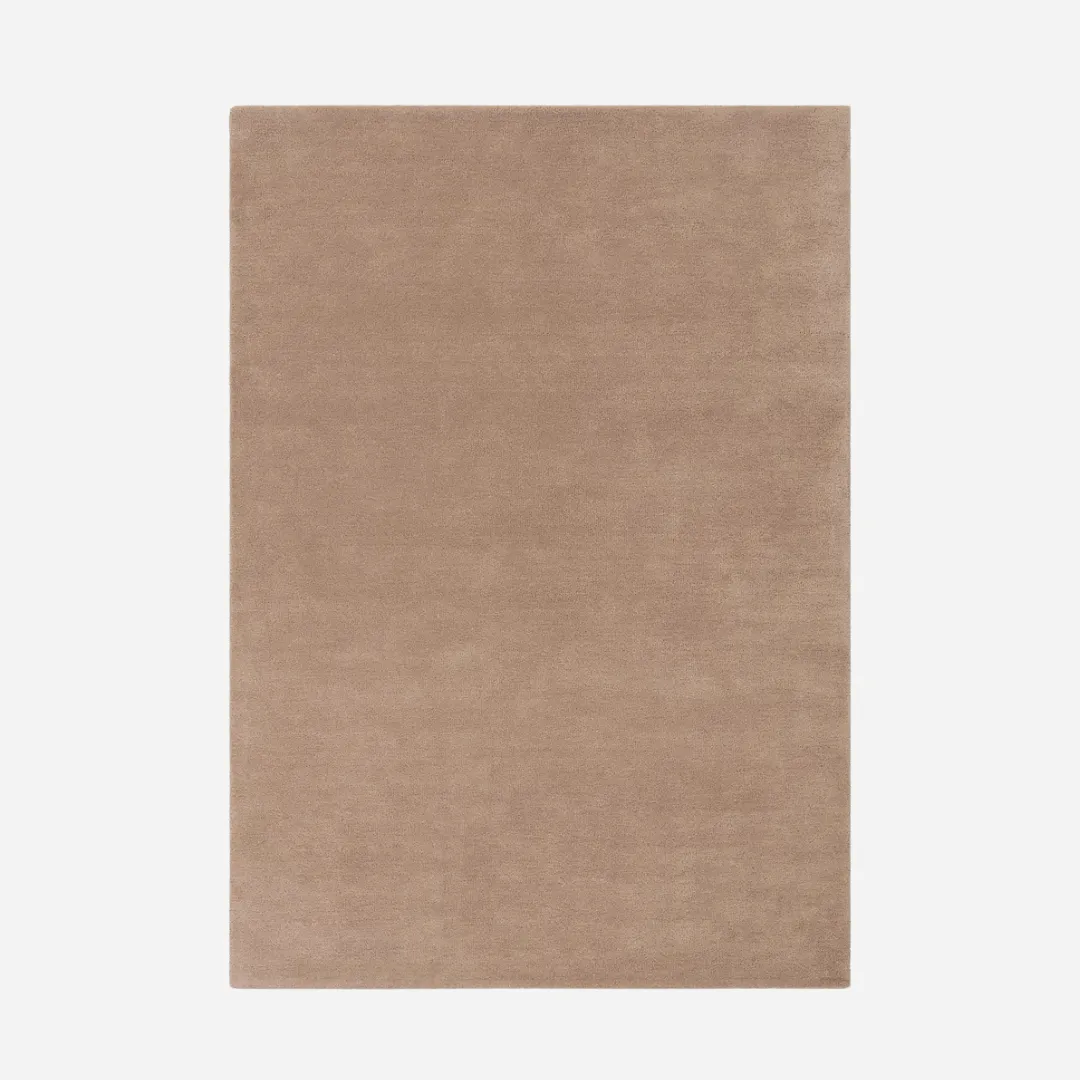 Solid brown area rug with hand-tufted wool texture