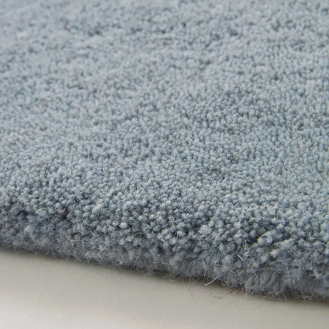 Minimal gray wool rug in living room