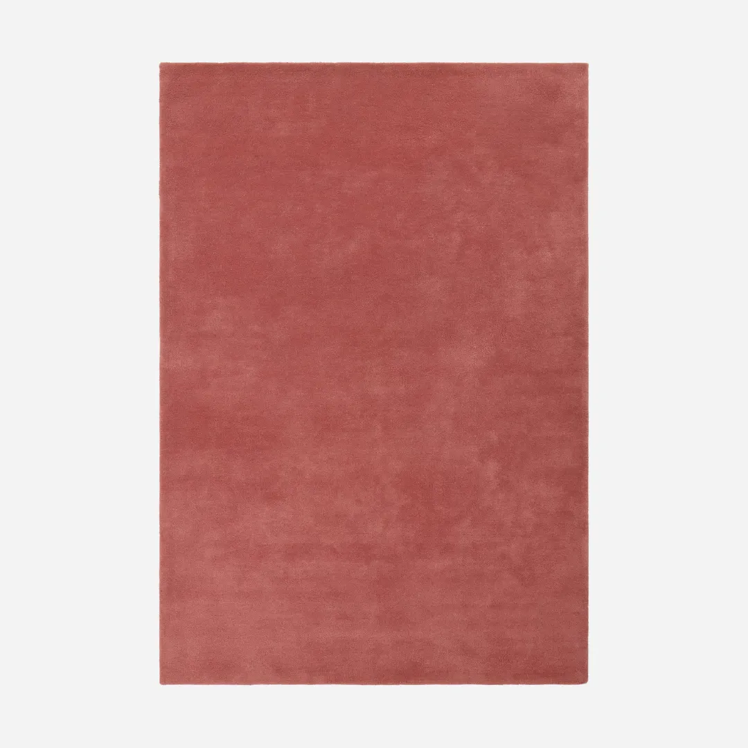 Solid red area rug in rose dusty red tone