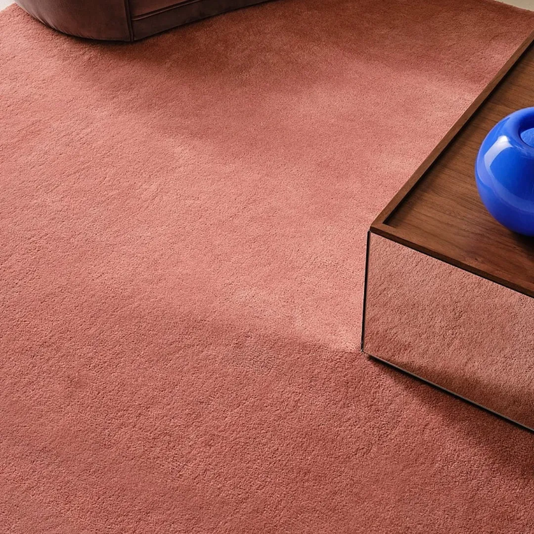 Hand-tufted red wool rug for cozy interiors