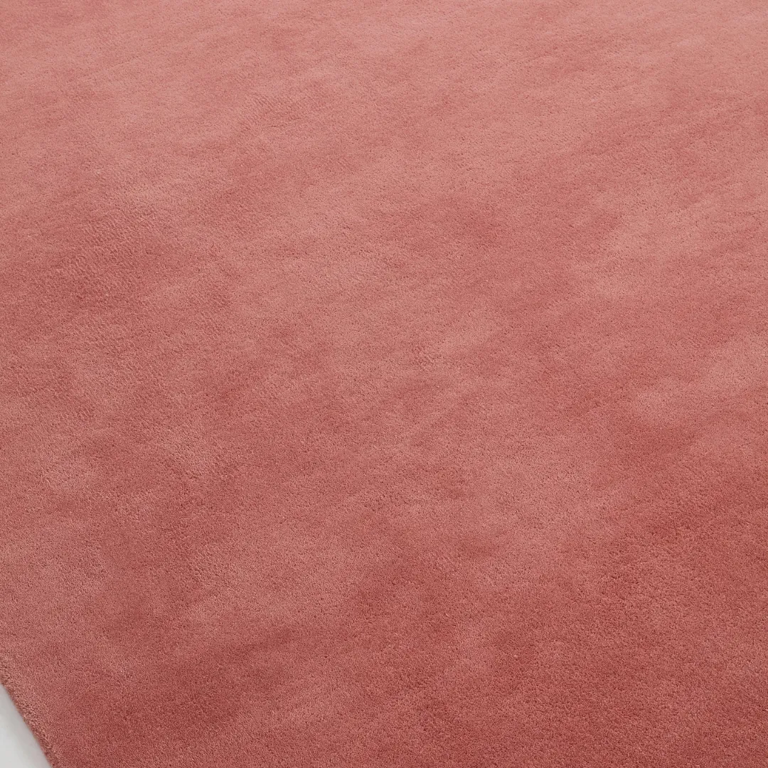 Hand-tufted red wool rug for cozy interiors