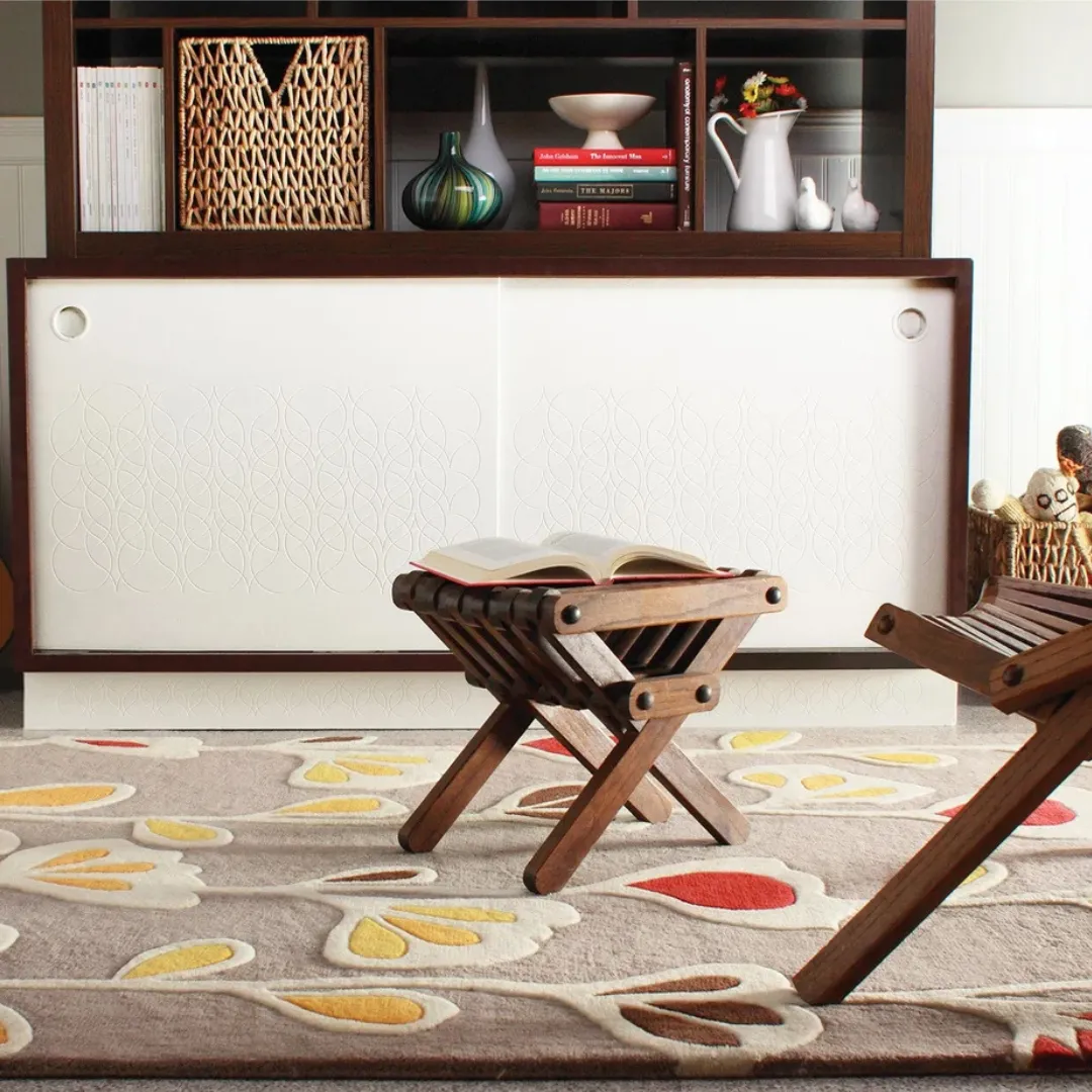 Soft wool rug with floral design on gray background