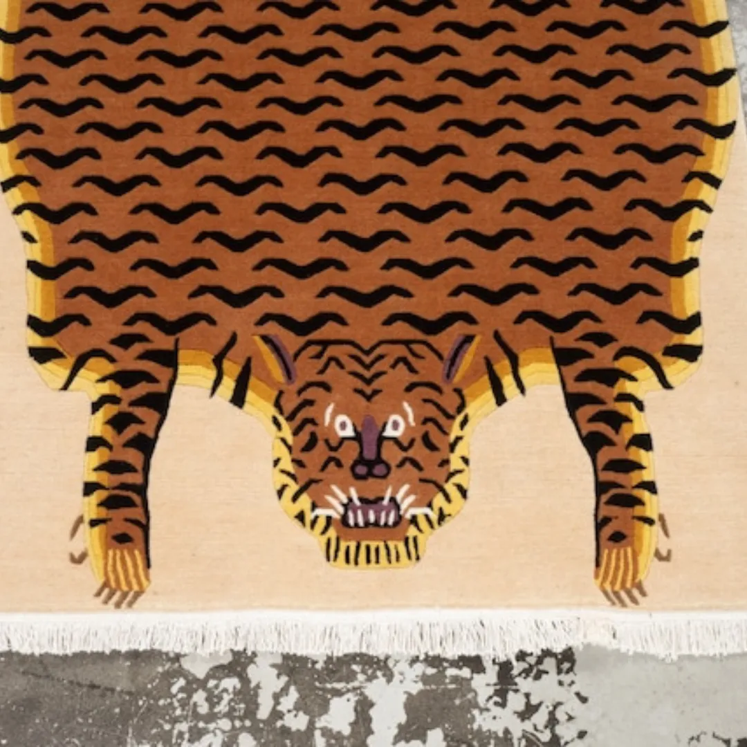 Cultural rug with tiger design on concrete floor background
