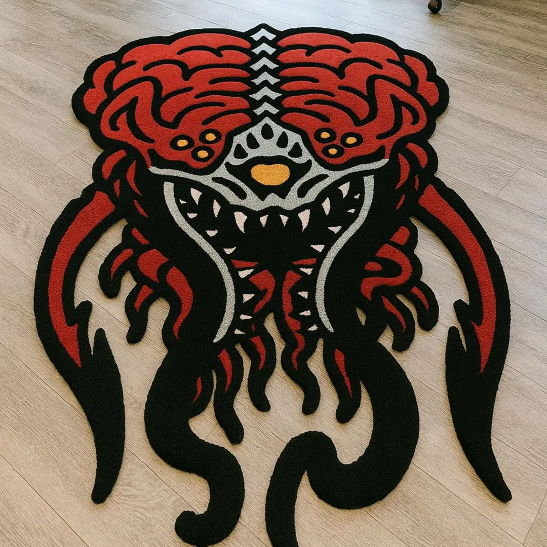 Tattoo-style demon face wool rug in red and black