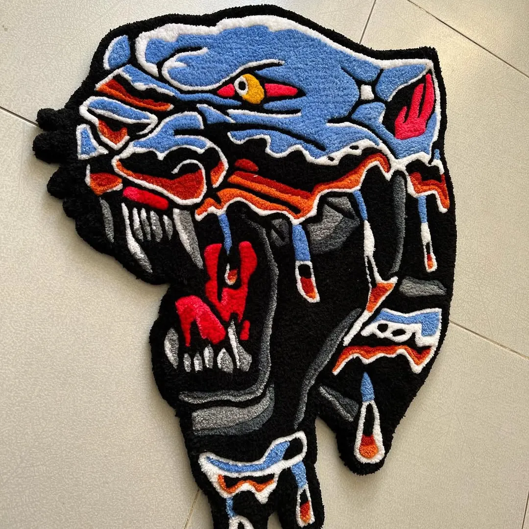 Custom-shaped rug featuring a roaring black panther with blue, red, and orange tattoo accents.