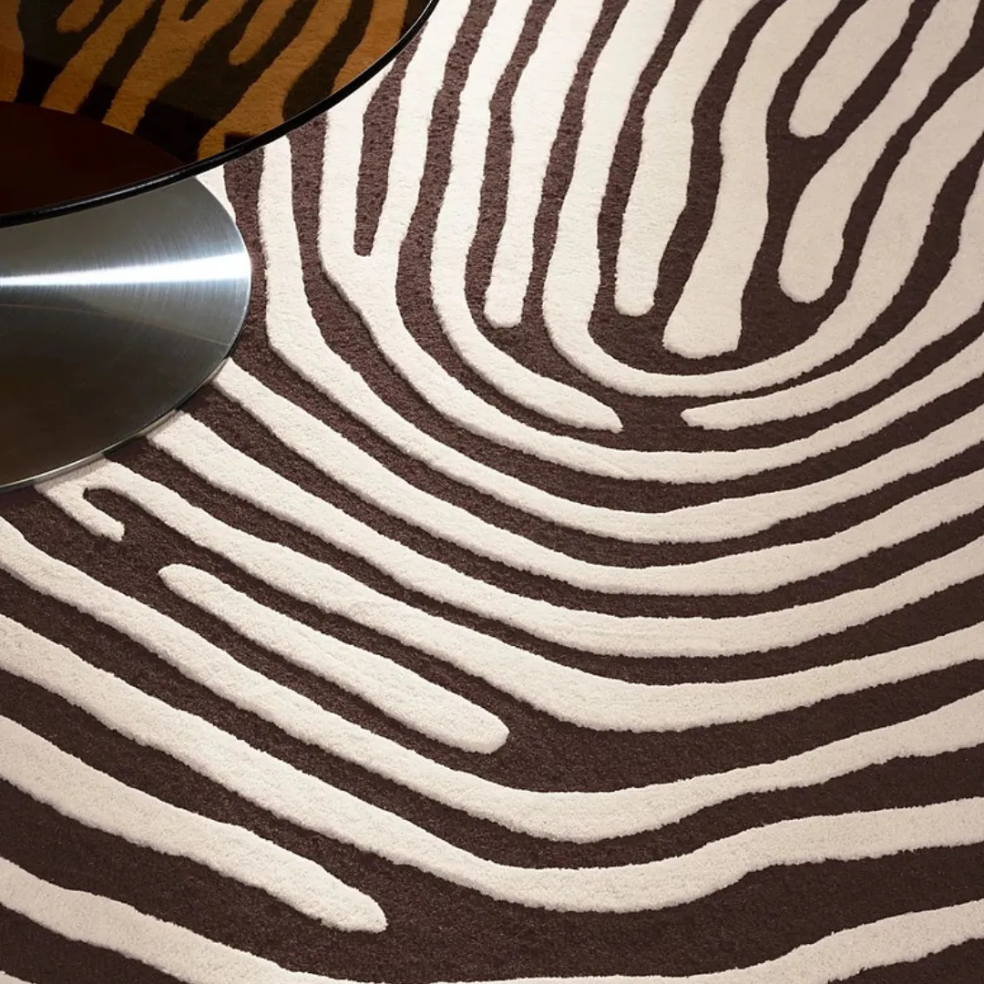 Circular rug featuring fingerprint lines