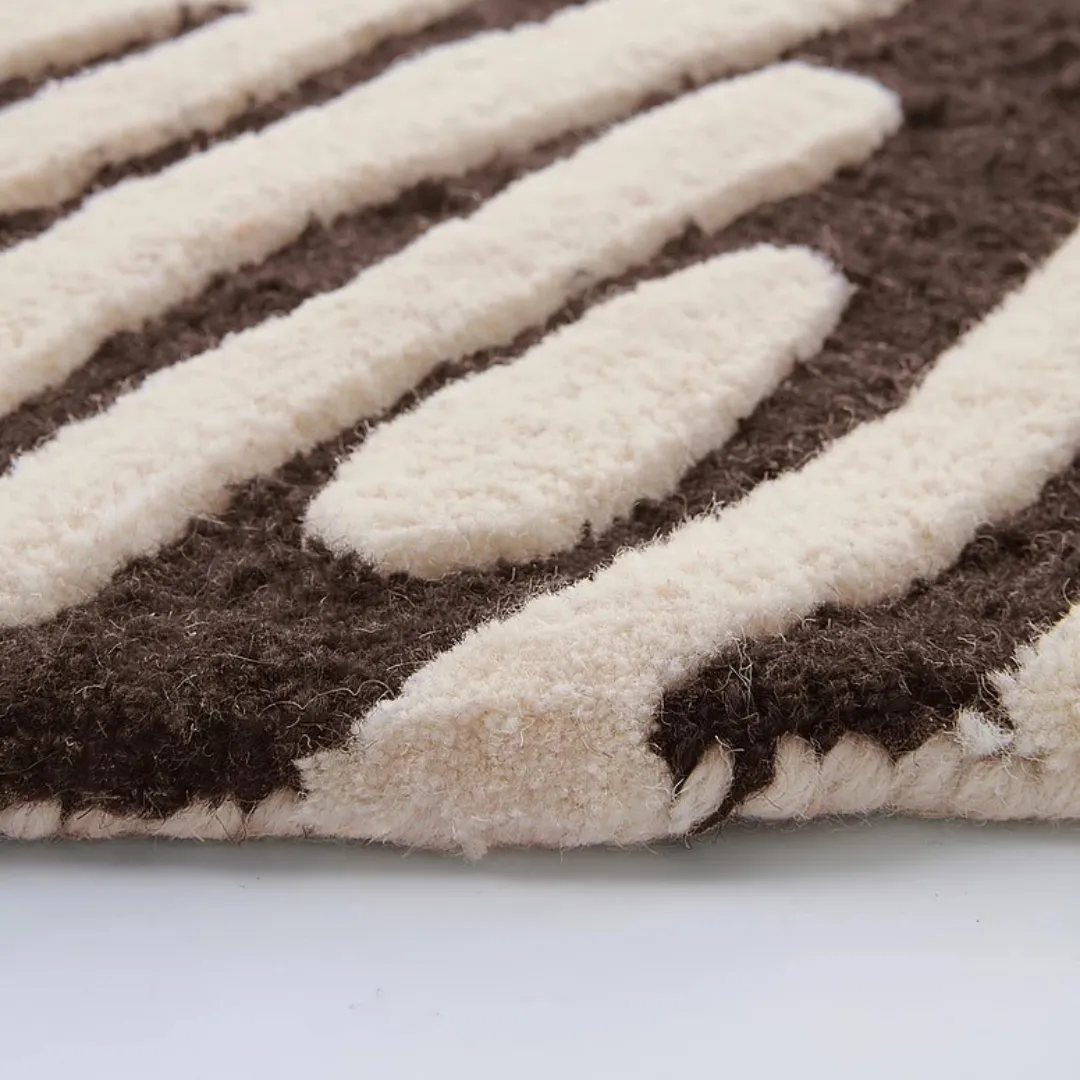 Soft wool rug with creative swirl design