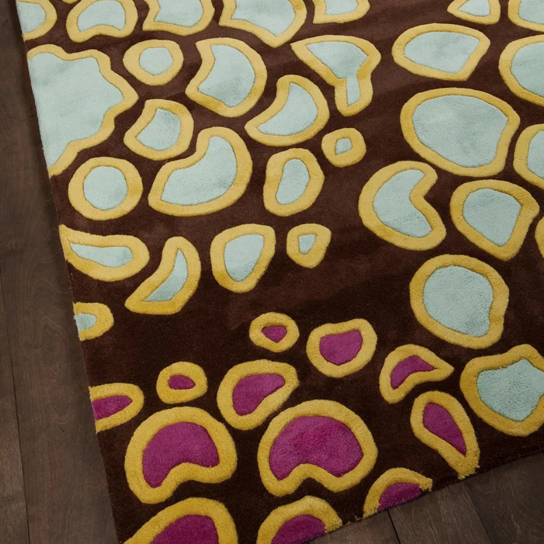 Vibrant floral area rug in pink, yellow, and blue shades