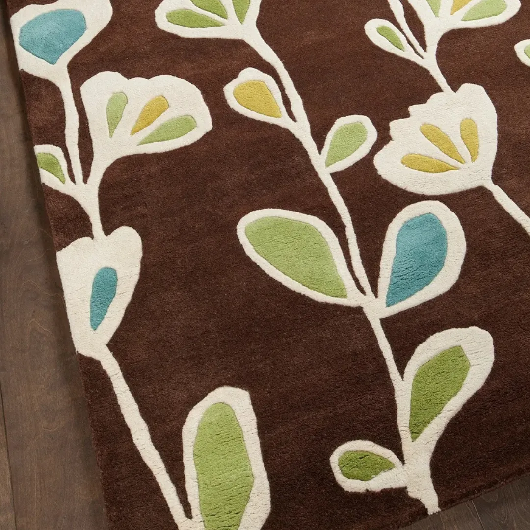 Elegant floral rug in shades of blue, green, and yellow