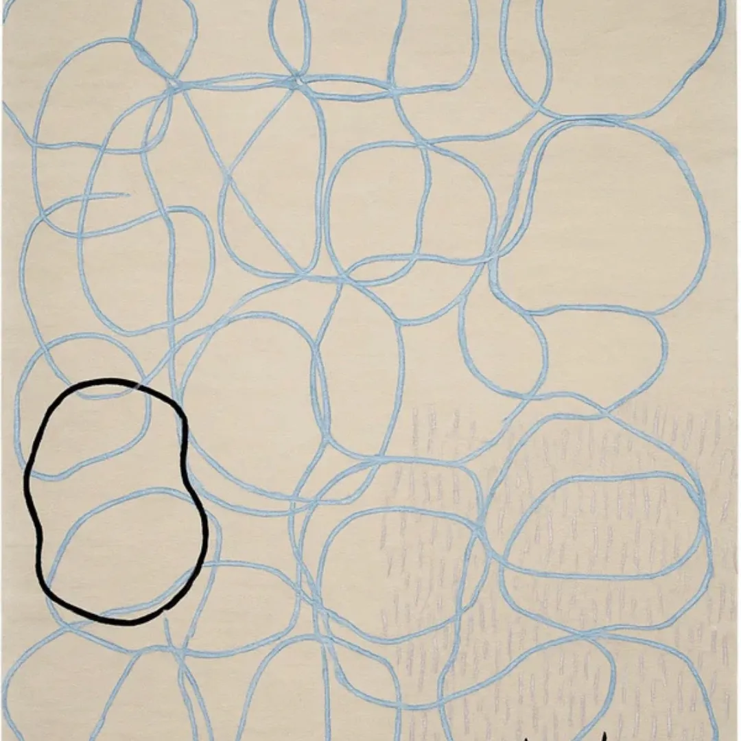 Modern off-white rug with freeform looping design