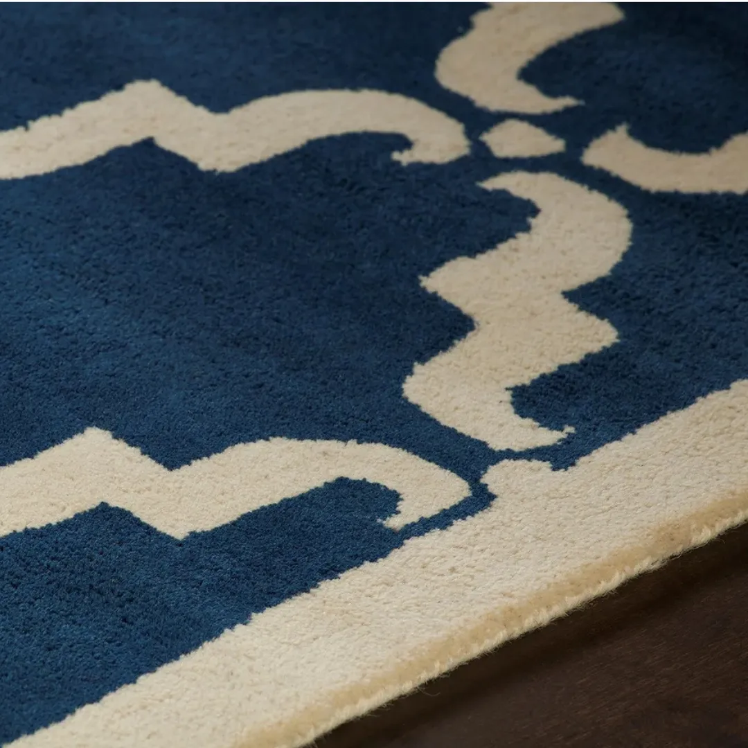 Intricate geometric design rug in navy and white for living rooms