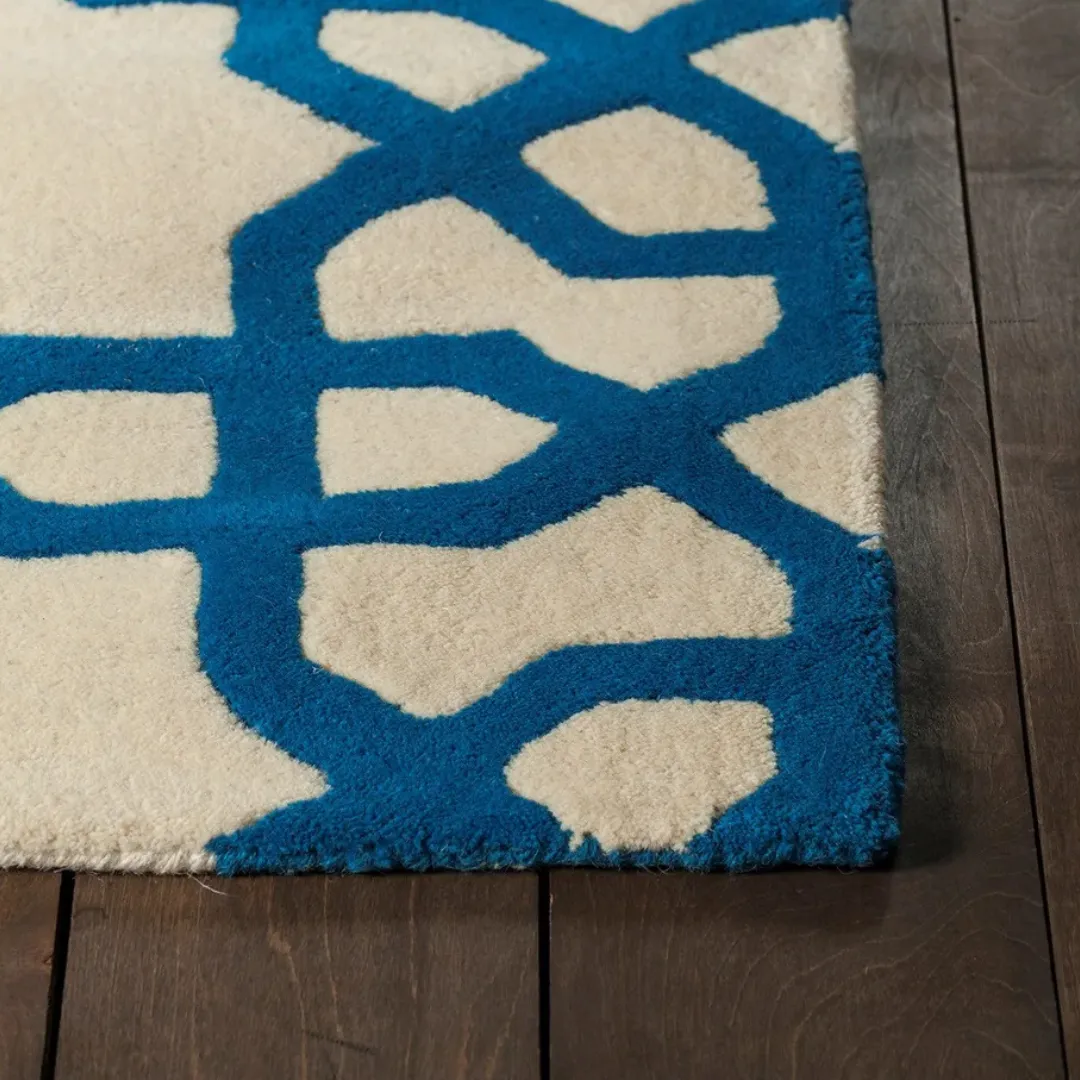 Contemporary geometric rug in blue and cream for modern spaces