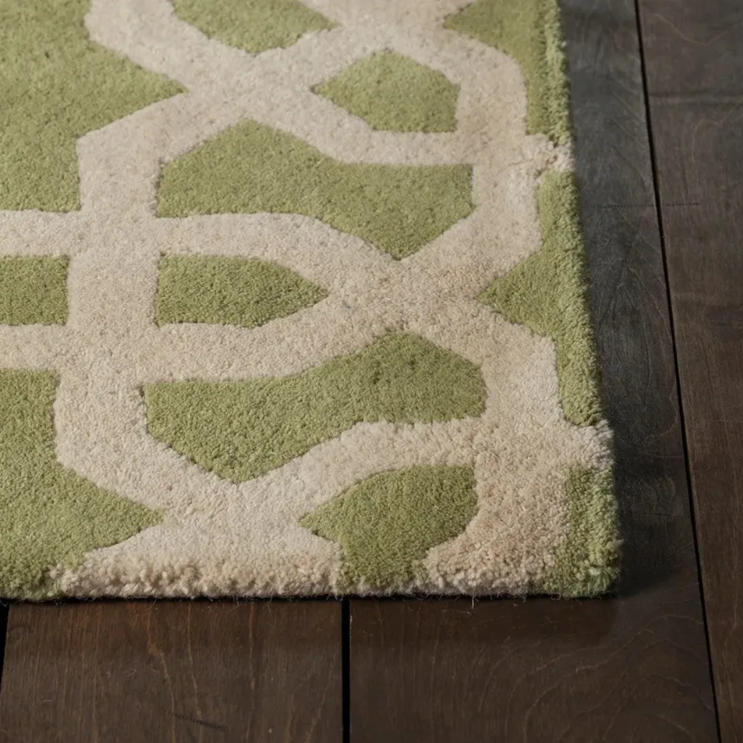 Soft wool rug with star-like shapes in green and beige