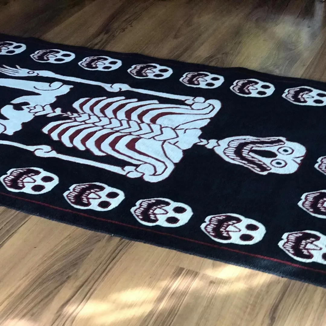 Hand-tufted detail of bone-white skeleton rug design