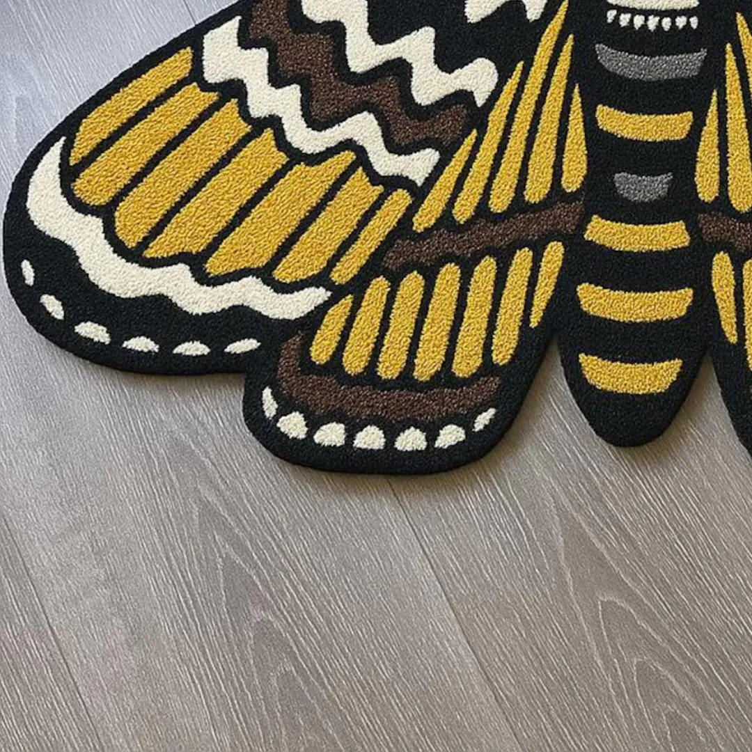 Gothic tattoo art-inspired skull moth rug