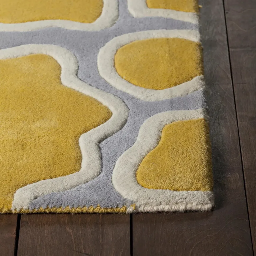 Artistic floral rug with red, yellow, and blue color palette