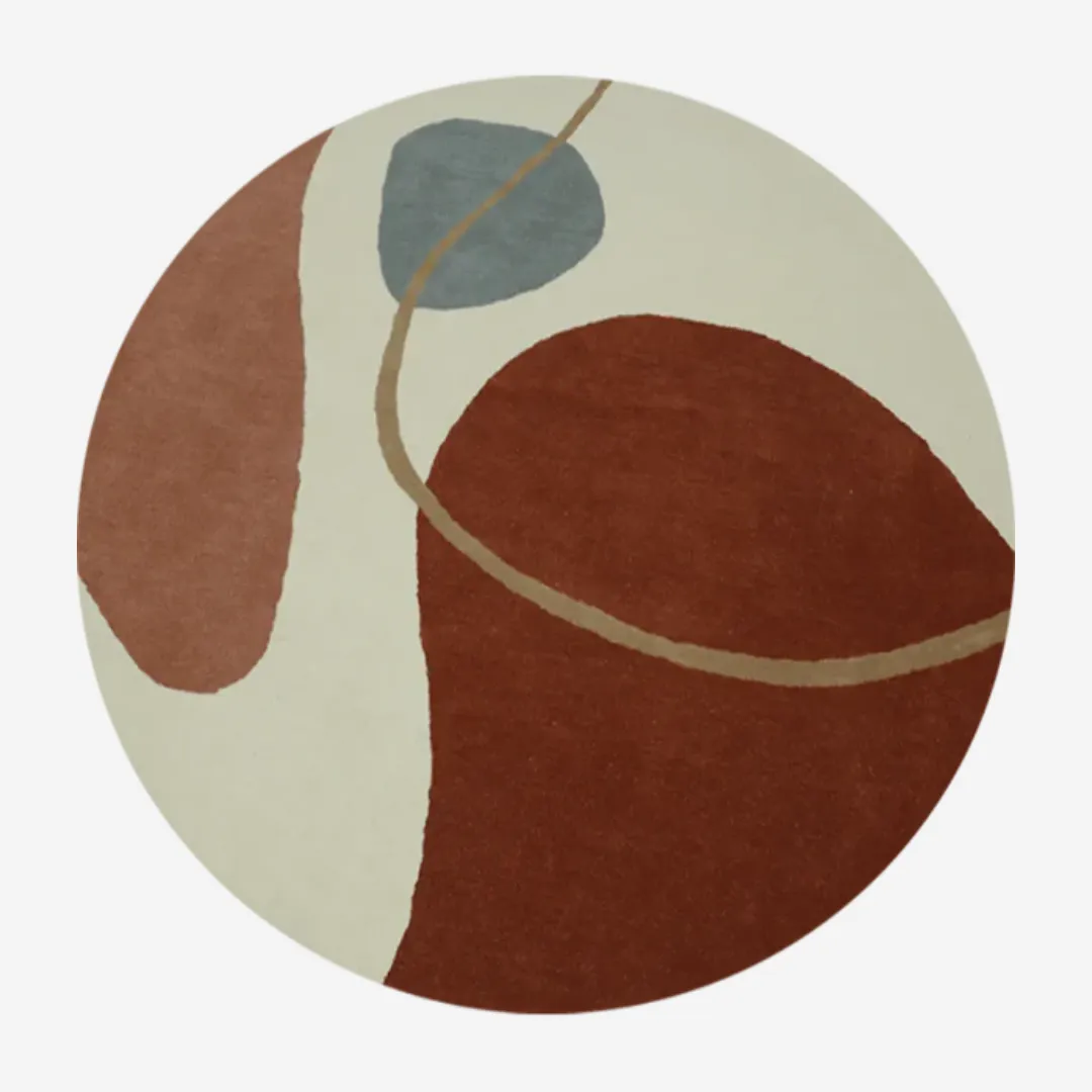 Abstract round rug featuring terracotta, gray, and ivory organic shapes.