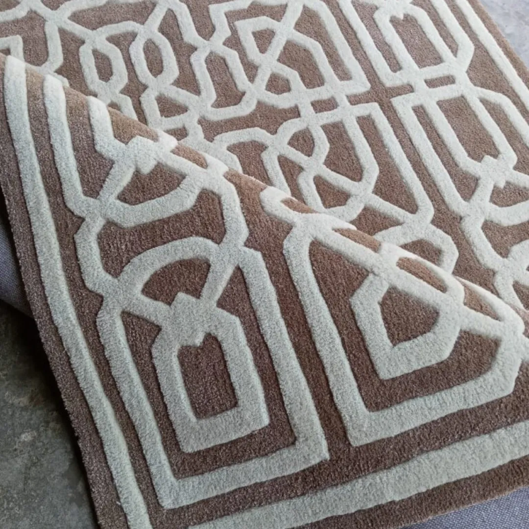 Sophisticated geometric rug featuring interlocking patterns in beige.