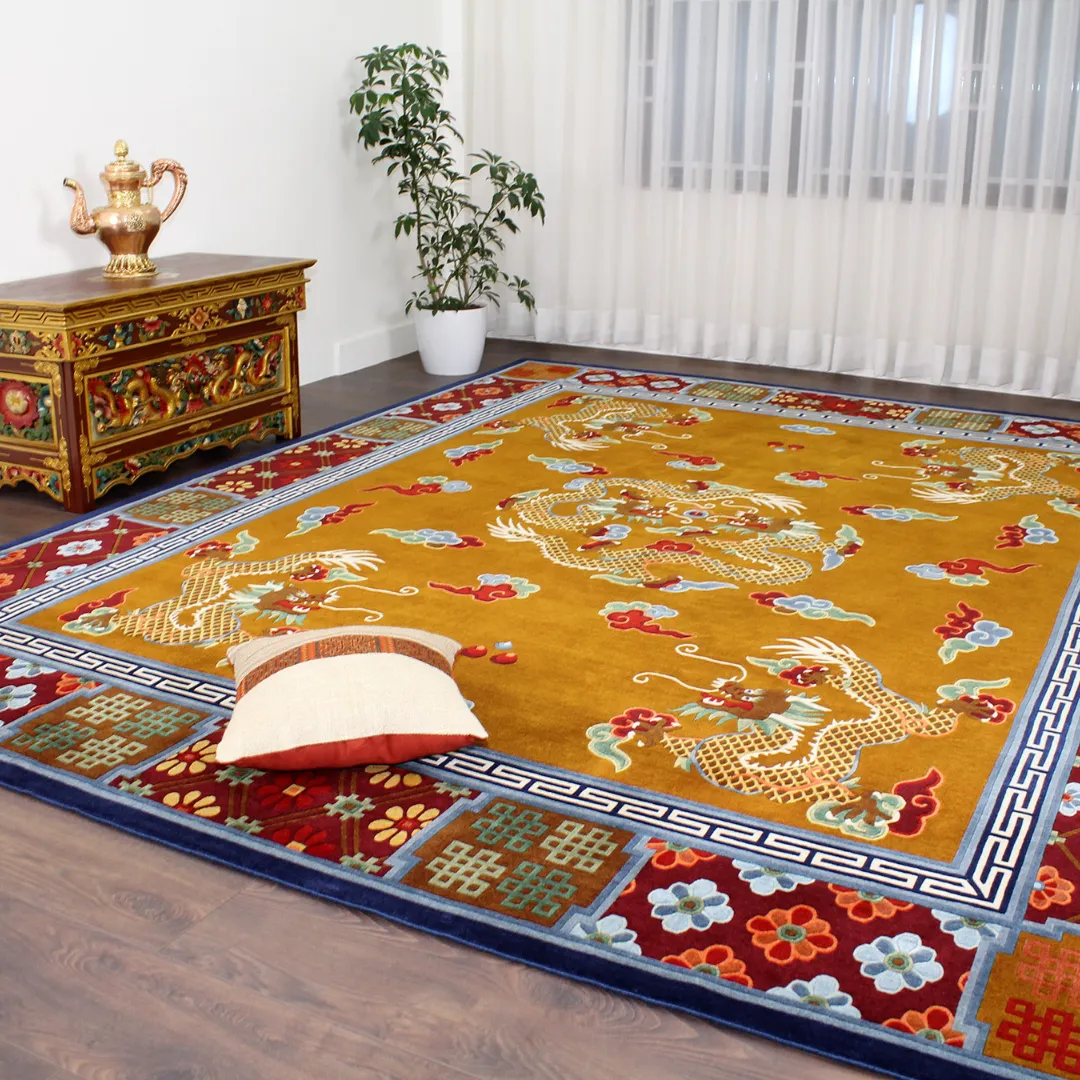 Imperial-style rug featuring dragon and phoenix designs in rich red, blue, and gold.