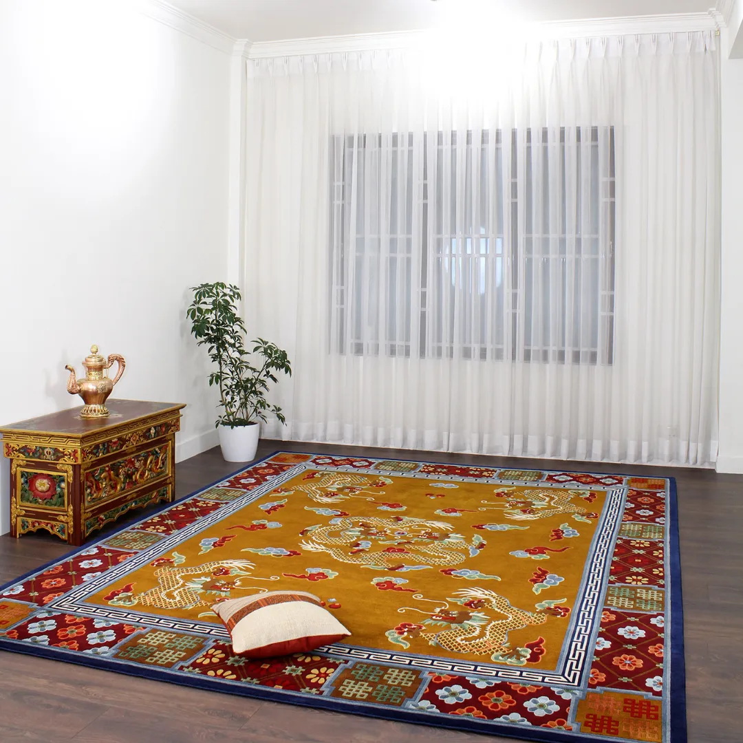 Phoenix and dragon rug in gold with intricate, cultural patterns.
