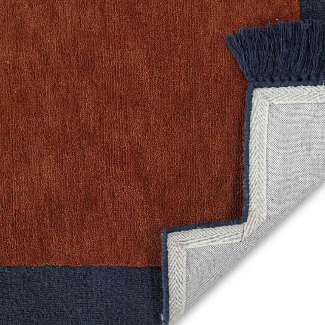 Contemporary area rug in soft pastel shades with geometric patterns.