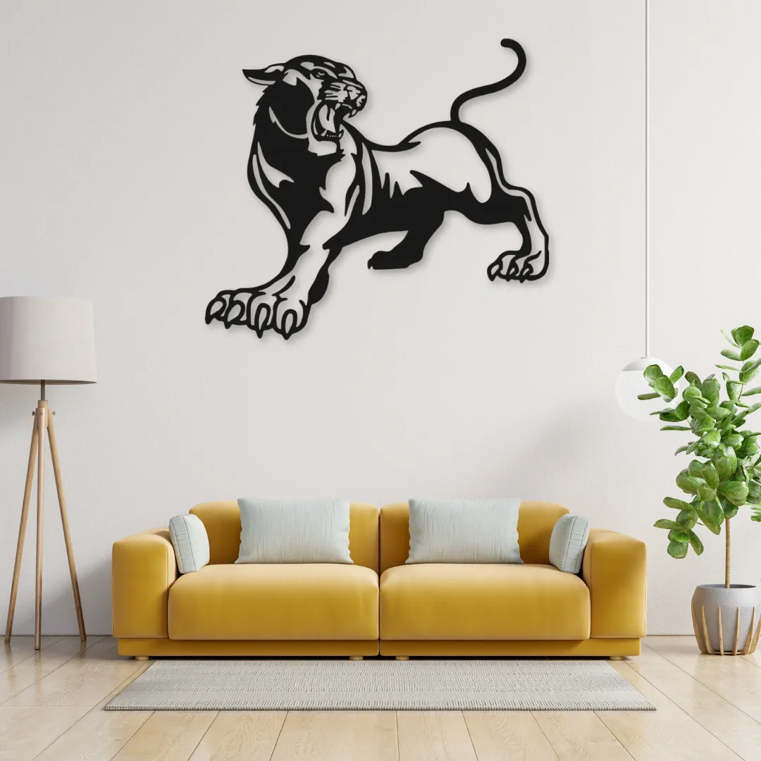 Savage Panther Silhouettes Fierce panther metal wall art above yellow sofa.
