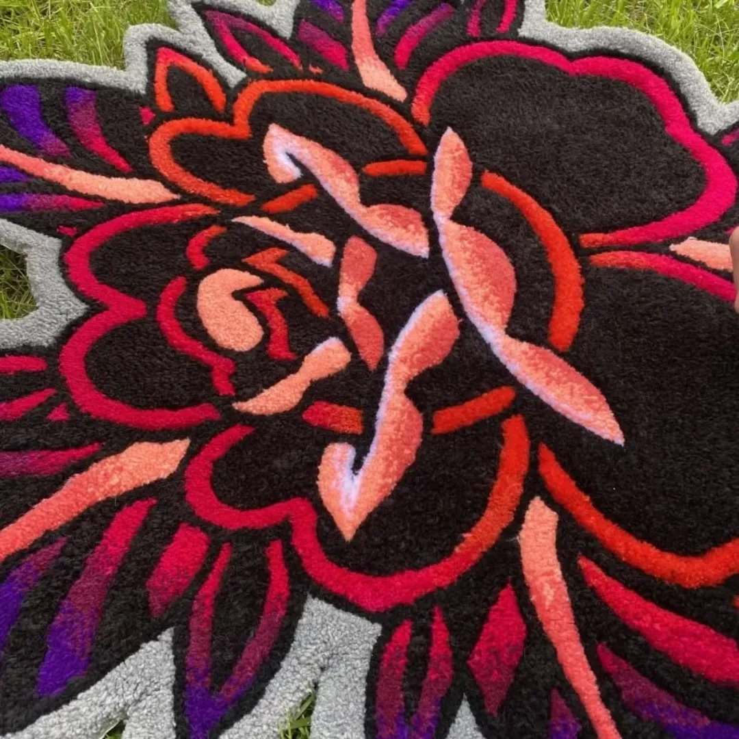 Crimson Rug Handmade Crimson Bloom Rug showcasing deep red and purple tones in a modern floral motif