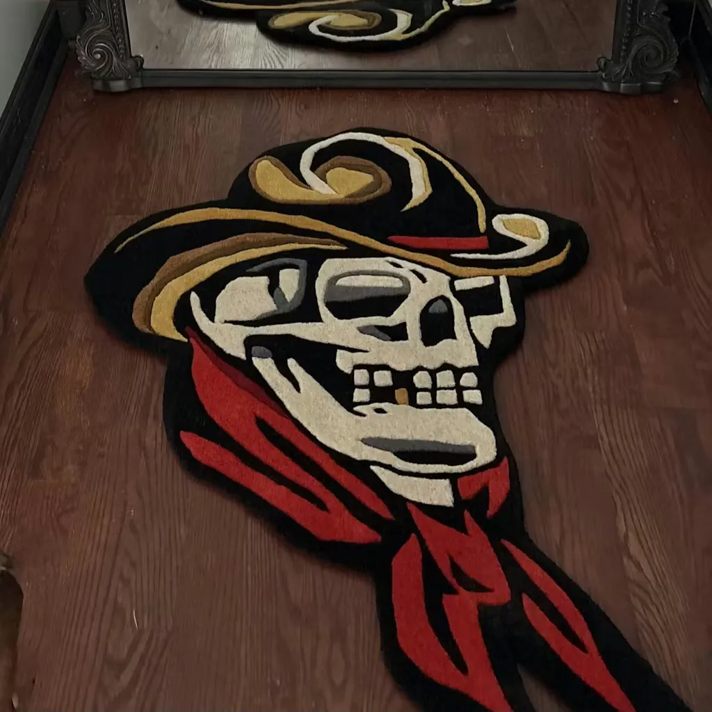 Hand Tufted Old School Tattoo Design Rug A custom die cut area rug shaped like a cowboy skull with traditional flash art styling and dense wool texture, shown from an angled perspective.