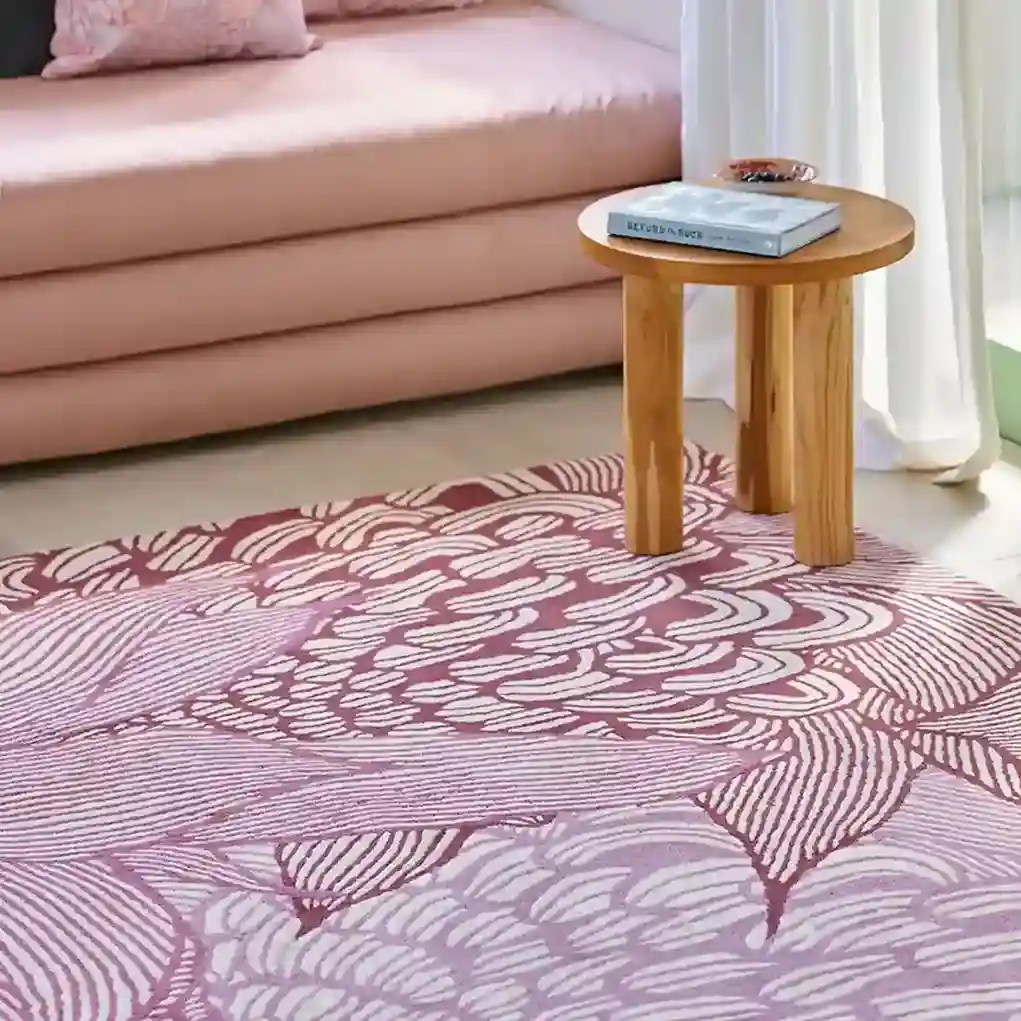 Cascade Wool Pink Rug in a modern living room setting, adding elegance and softness to the space"
