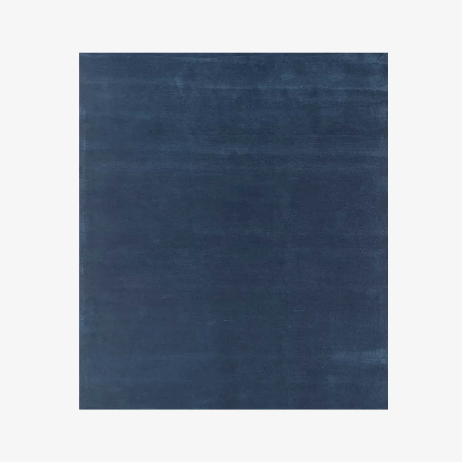 Cera Performance Solid Blue Area Rug perfect for modern living room decor.