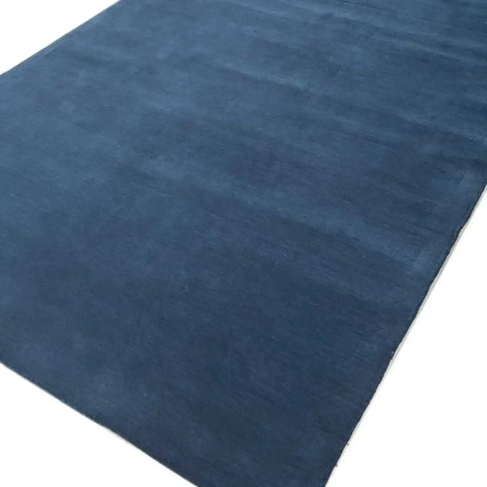 Solid blue area rug for modern homes with high-performance durability.