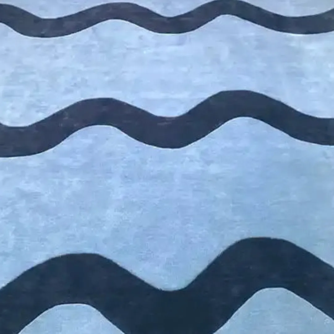 Wavy solid blue hand-tufted kitchen runner rug made of wool, styled in a modern galley kitchen rugs.